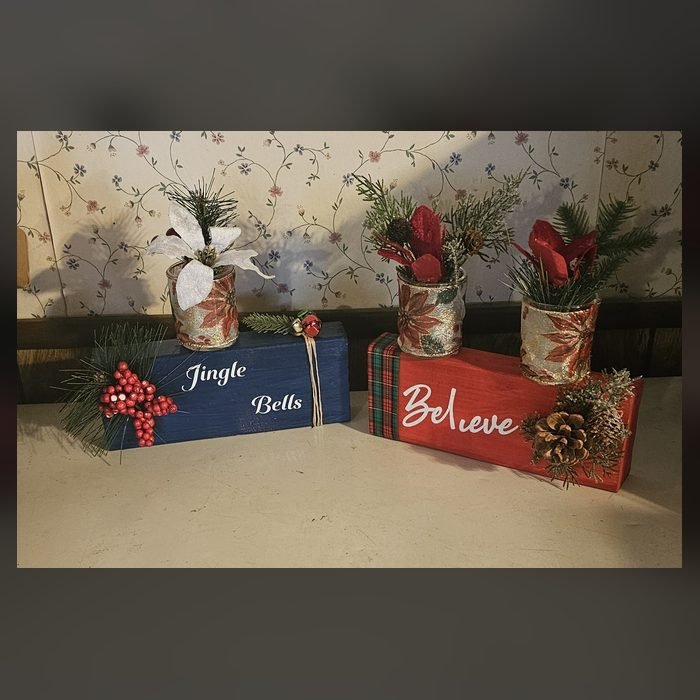 Wooden Christmas word blocks reading Jingle and Believe